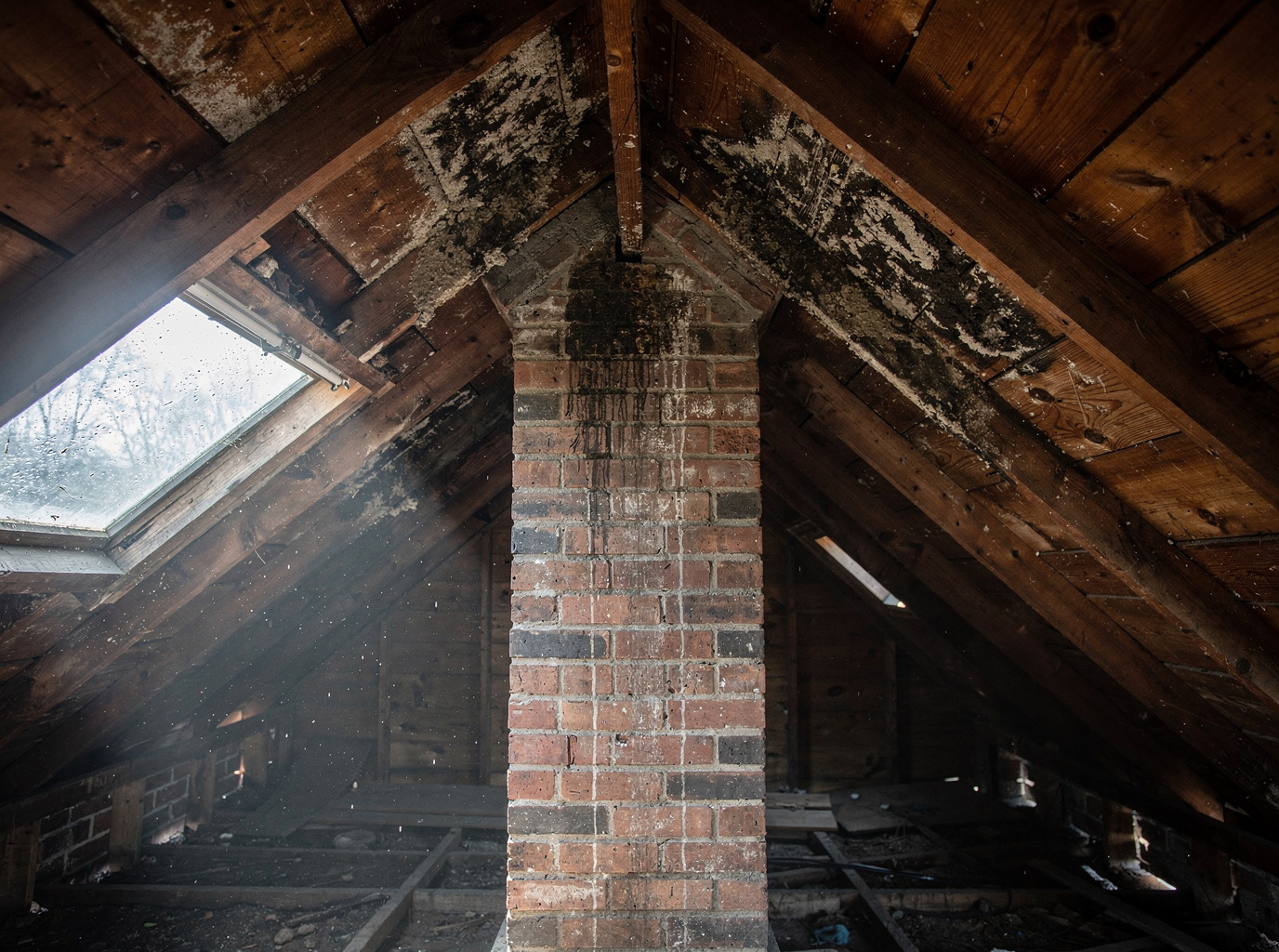 Attic Mold and Chimney Leaks in Rochester's Older Chimneys
